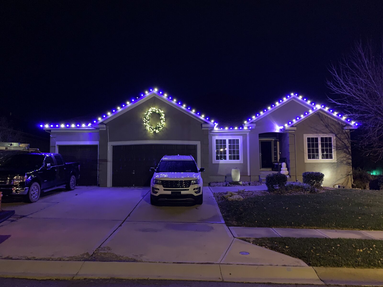 Christmas light installation on residential property — C9 LED bulbs